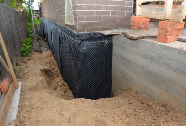 Happy homeowners after waterproofing job in Chippewa Lake